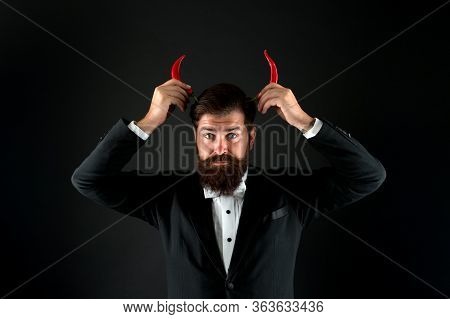 Hot As Hell. Handsome Macho Likes Taste. Man Hold Pepper Harvest. Red Horns. Stubborn Bearded Busine
