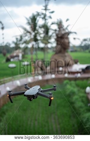 Professional Drone Flying Over Ancient Stone Idol Monument