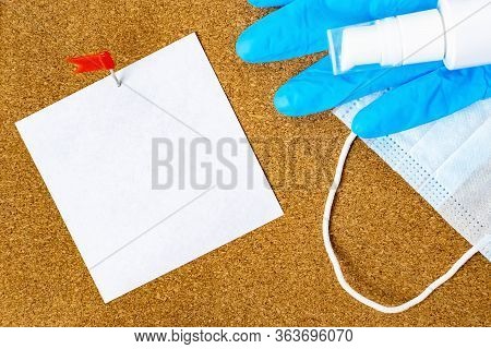 A Blank White Paper Sticker Pinned To A Clip With A Red Flag On A Cork Board For Notes, And A Medica