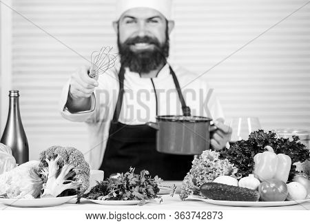Use Hand Whisk. Professional Chef Hold Whisk And Pot. Whipping Like Pro. Man Bearded Guy In Apron Wh