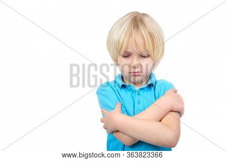 Sad boy portrait isolated in studio on white