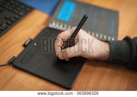 Close-up Detail View Of Hand Work On Graphic Tablet