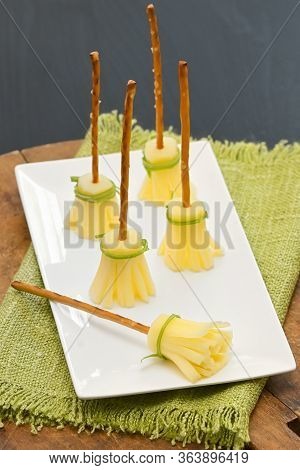 Snack Cheese And Salt Sticks Broomsticks On Plate