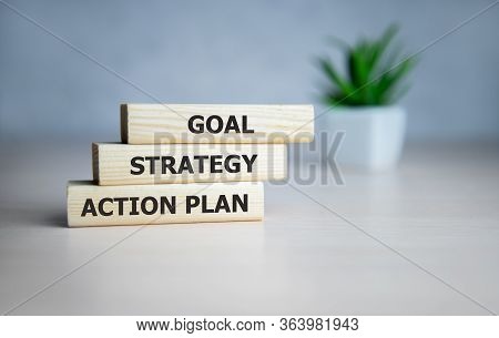 Business Text On Wooden Blocks, Business Process Concept Goal - Strategy - Action Plan
