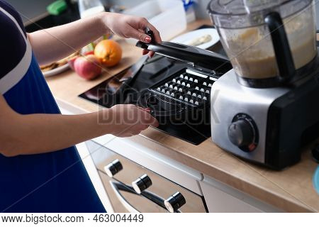 Woman Opens Belgian Waffle Iron To Make Waffles In Kitchen. Kitchen Appliances For Making Sweets