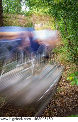 Family Enjoying The Rail Bike Attraction And Having Fun In The Netherlands, Havelte.