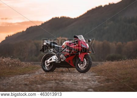 Krasnoyarsk, Russia - August 31, 2022: Red And Black Sportbike Honda Cbr 600 Rr 2005 Pc37 On Sunset.