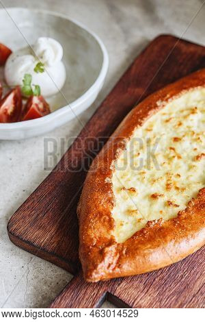 Traditional Turkish Baked Pide Dish. Middle Eastern Snacks. Turkish Pizza. Turkish Pide With Cheese 