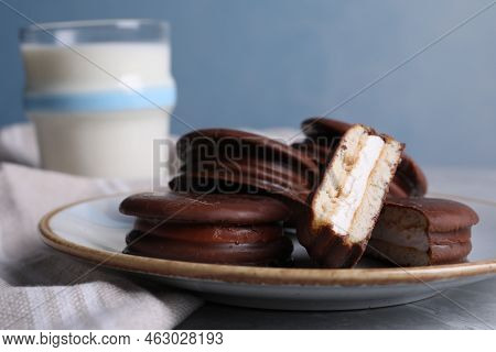 Tasty Choco Pies And Milk On Grey Table, Closeup View