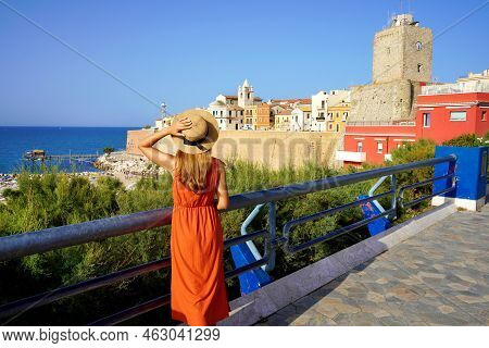 Tourist Woman In Termoli With Historic Town Fortified And Castle In Molise, Italy