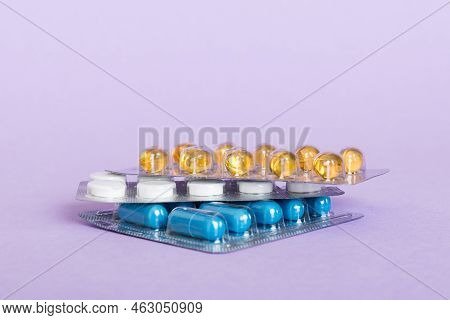 Too Many Different Pill Cartridges Stacked. Selective Focus. Packs Of Blister Pills With Tablets. Co