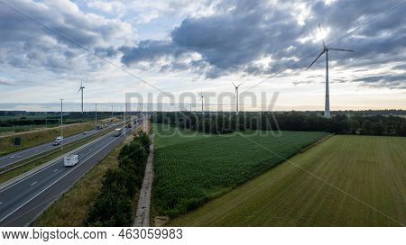 Brecht, Belgium, 6th Of July, 2022, Panoramic Aerial Drone View Of Wind Farm Or Wind Park, With High