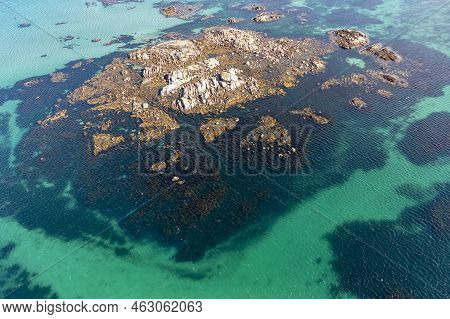 Aerial View Of Rocks At Cloughcorr Beach On Arranmore Island In County Donegal, Republic Of Ireland