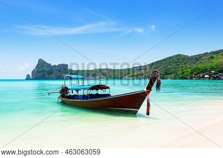 Thai Traditional Wooden Longtail Boat And Beautiful Sand Beach At Koh Phi Phi Island In Krabi Provin
