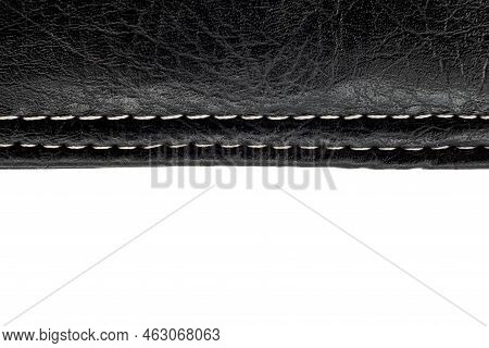 A Piece Of Leather Stitched With Threads On A White Background With Free Space For An Inscription. L