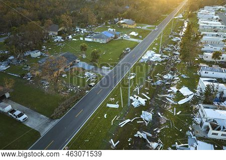 Severely Damaged By Hurricane Ian Houses In Florida Mobile Home Residential Area. Consequences Of Na