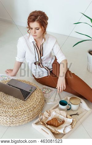 Tver, Russia-july 31, 2022 A Woman With A Laptop Is Studying Human Design. The Concept Of Studying E