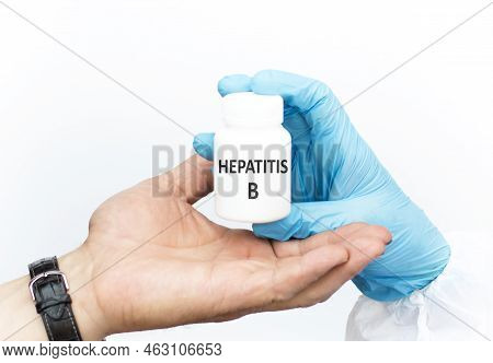 Hepatits B Text On The Jar The Doctor Passes It To The Patient On A Light Background