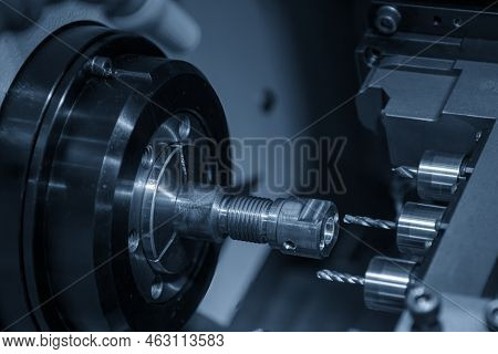 The Multi-tasking Cnc Lathe Machine Swiss Type Drilling The Brass Shaft Parts. The High Technology M