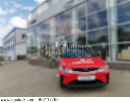 Abstract Blurred Outside Of Car Dealership.