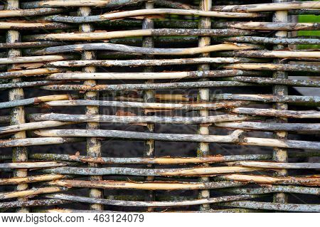 Old Traditional Handmade Wicker Fence Pattern And Texture.