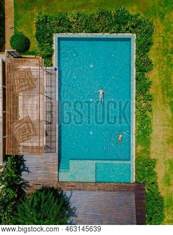 Aerial Drone View Of Swimming Pool In The Jungle Of Krabi Thailand, Aerial View With A Drone Above S