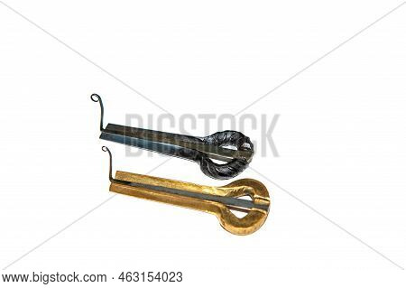 Jew's Harp Musical Instrument On White Background