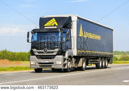 Vladimir Region, Russia - May 29, 2013: Black Semi-trailer Truck Mercedes-benz Axor 1836 At An Inter