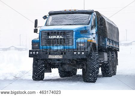 Novyy Urengoy, Russia - January 25, 2020: Flatbed Offroad Truck Ural-4320 Next In The City Street Du