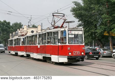 Chelyabinsk, Russia - July 2, 2008: Bright Red Soviet Tram 71-605 (ktm-5) In A City Street.
