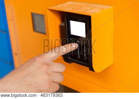 Finger Dials Pin Code On Terminal. Transaction Pay And Shopping Concept. Close Up Of Male Hand Enter