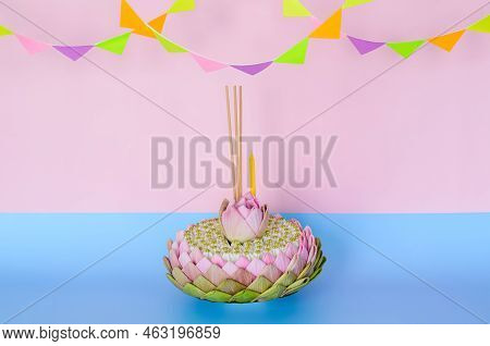 Pink Lotus Petal Krathong That Have 3 Incense Sticks And Candle Decorates With Lotus And Crown Flowe