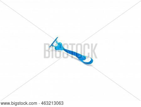 Single Brand New Blue And White Plastic Disposable Razor With Ergonomic Handle Isolated On White Bac