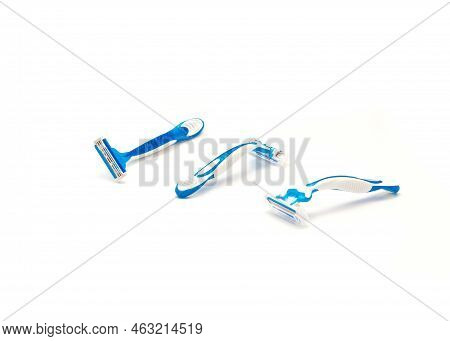 Sharp Plastic Disposable Razors With Ergonomic Handle Isolated On White Background