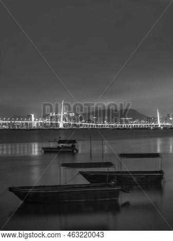 Skyline Of Shenzhen City, China At Night. Viewed From Hong Kong Border Lau Fau Shan