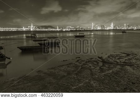 Skyline Of Shenzhen City, China At Night. Viewed From Hong Kong Border Lau Fau Shan