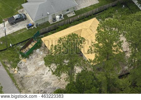 Aerial View Of Typical Contemporary American Private House With Roof Top Covered With Asphalt Shingl