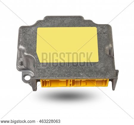 Metallic Car Engine Control Unit With Plastic Elements Soaring On A White Isolated Background Is Con