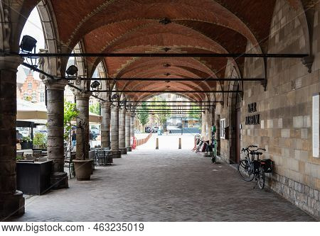 Ieper, West Flanders Region - Belgium - 07 15 2021 Arched Halls At The Market Square In Old Town