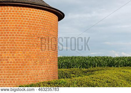 Denderwindeke, Ninove, East Flemish Region - Belgium - 07 14 2021 Brick Stone Chapel In The Agricult