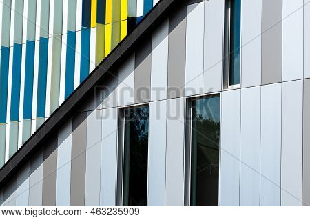 Dilbeek, Flemish Brabant Region, Belgium - 7 2 2021 Abstract Colors And Lines From The Facade Of A C