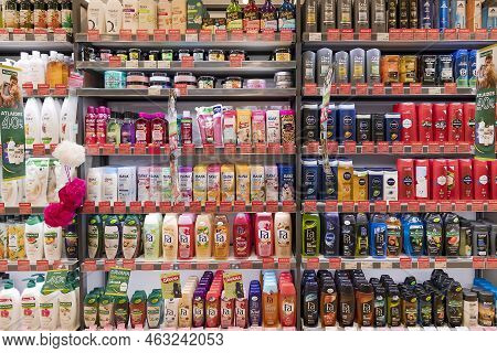 Latvia, Riga, October, 2022: Shelves With Shampoos And Conditioners With Reduced Prices On Sale In R