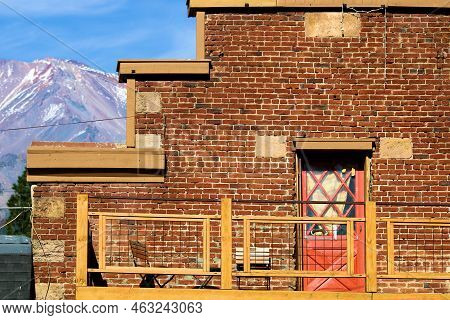 October 5, 2022 In Mt Shasta, Ca:  Vintage Brick Building Built During The Late 1800s With Mt Shasta