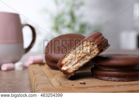 Tasty Choco Pies On Wooden Board, Closeup View