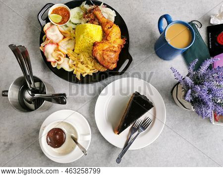 Top View Lunch Set With Drinks And Dessert On The Table.