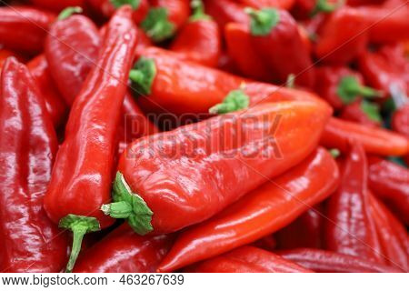 Ramiro Pepper Close Up. Red Sweet Peppers On A Market, Paprika, Vegetable Background