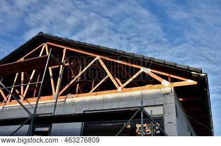 The Trusses Are Made From High-quality, Strength-graded Lumber And Connected By Steel Buttplates Wit