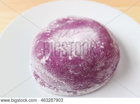Closeup Of Delectable Japanese Purple Sweet Potato Daifuku With Red Bean Paste Filling