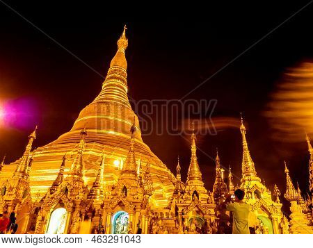 The Golden Pagodas And Mondops Are Illuminated In The Light Of The Night