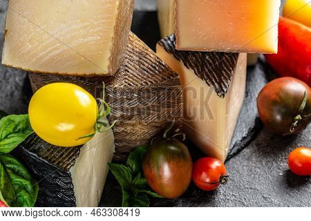 Cheese Board Of Various Types Of Soft And Hard Cheese. Spanish Manchego Cheese, International Dairy 